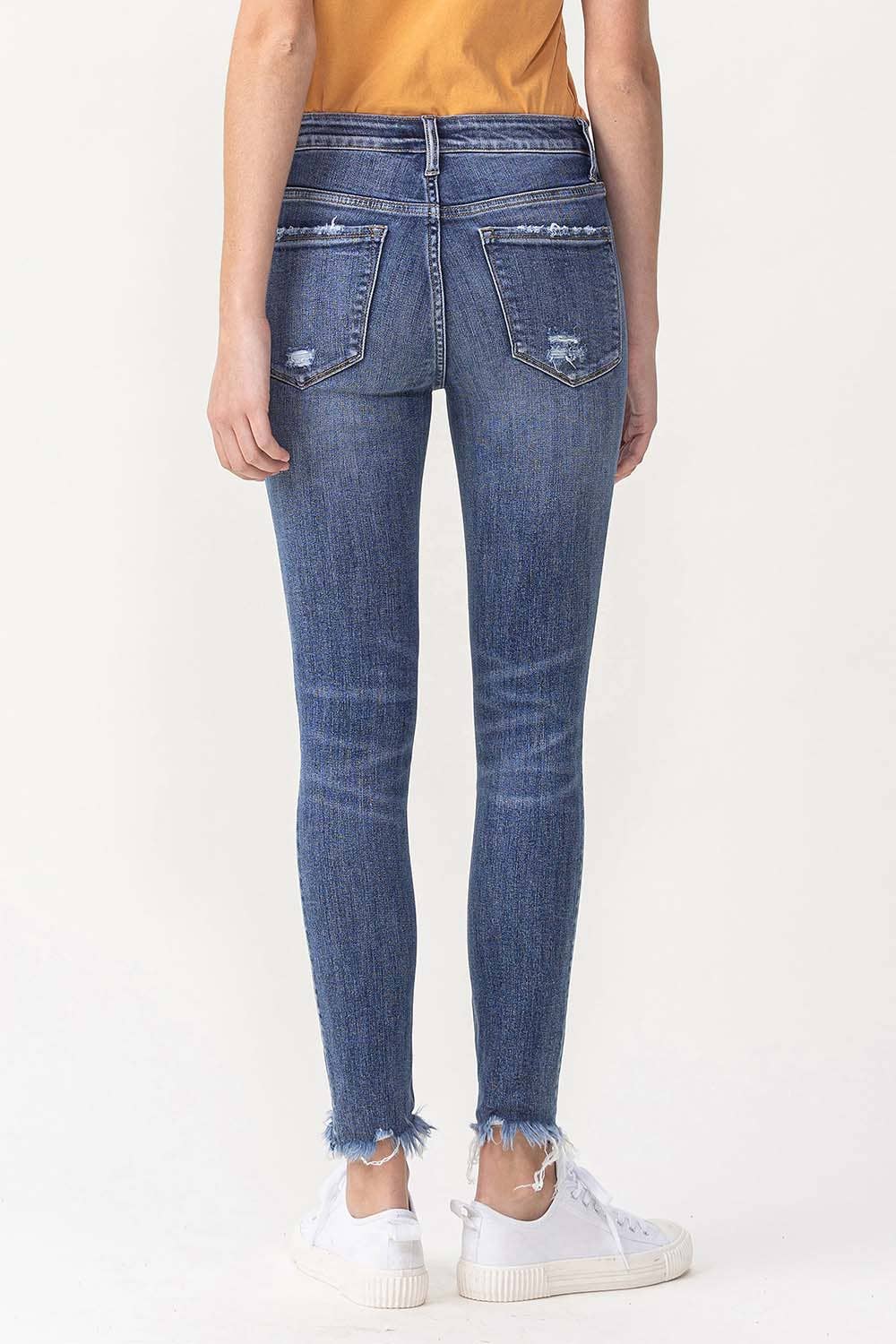 Fondly: MID RISE ANKLE SKINNY WITH FRAYED HEM