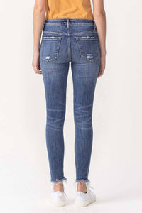 Fondly: MID RISE ANKLE SKINNY WITH FRAYED HEM